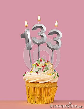 Number 133 candle with cupcake - Birthday card Stock Photo