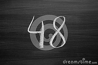 Number forty eight enumeration written with a chalk on the blackboard Stock Photo