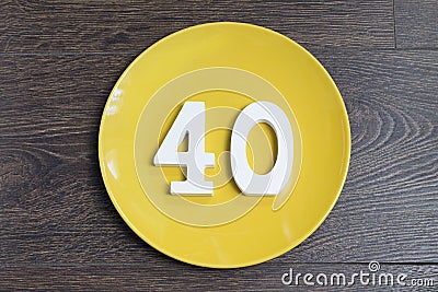 Number forty on the yellow plate. Stock Photo