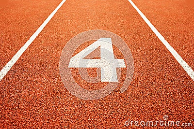 Number four on running track Stock Photo