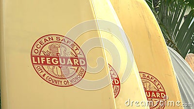 A number of lifeguard rescue surfboards at waikiki Editorial Stock Photo