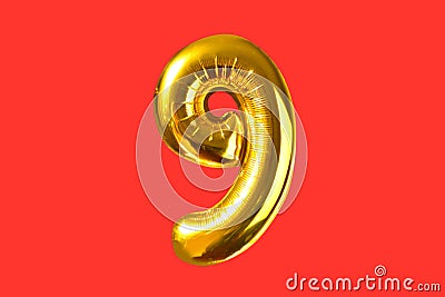 Number nine of golden helium balloons, isolated Stock Photo