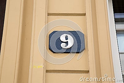 Number Nine on Stone Stock Photo