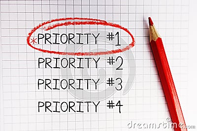 Number one priority marked with red circle on math notebook Stock Photo