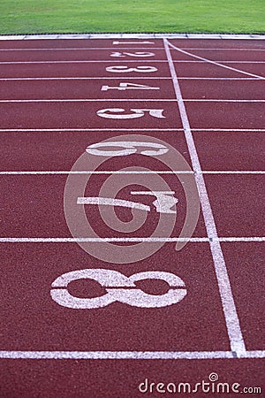 Number Start or finish position on running track in stadium Stock Photo