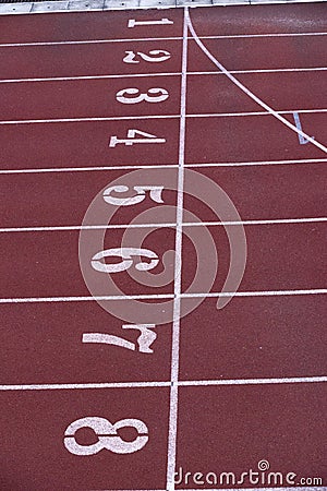 Number Start or finish position on running track in stadium Stock Photo