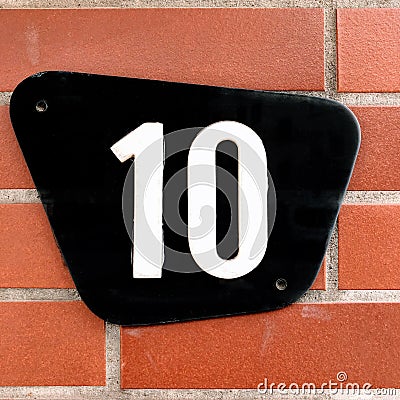 Number ten in arabic numerals - house number 10 sign Stock Photo