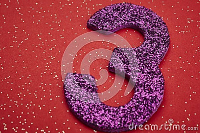 Number three purple color over a red background. Anniversary Stock Photo