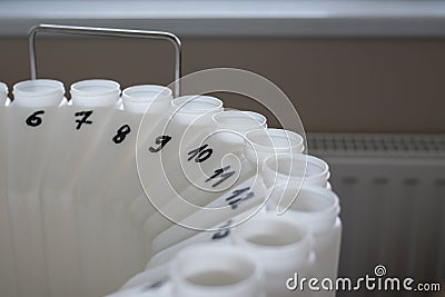 numbered containers of an automatic sampling machine for sampling wastewater and surface water for chemical analysis Stock Photo