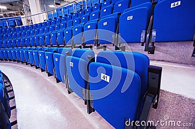 Numbered seats in row Stock Photo
