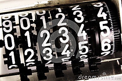 Numbers of an analog meter with the text 012345 Stock Photo