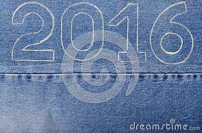 Numbers 2016 of chalk contour on the background of the jeans. Ch Stock Photo