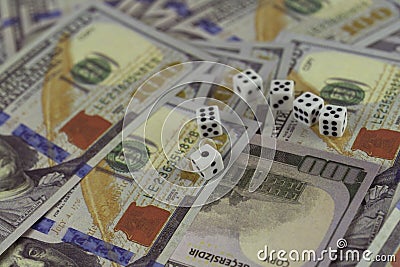 Numbers dice on Artificial American dollas for Background and concept idea Stock Photo