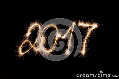 2017 numbers made lights on black background . Stock Photo