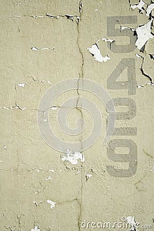 Numbers stencilled on old wall background Stock Photo