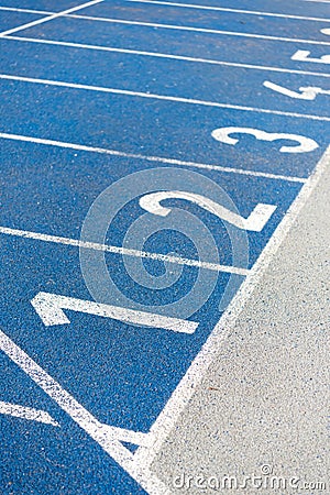 Numeration of running track on olympic stadium Stock Photo