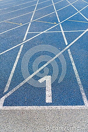 Numeration of running track on olympic stadium Stock Photo