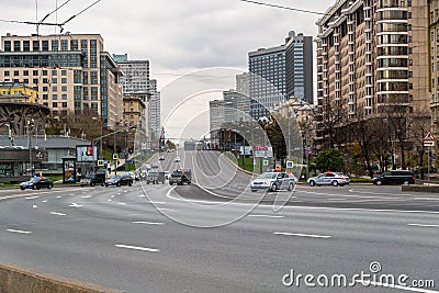 MOSCOW, RUSSIA - OCTOBER 24, 2017: Movement of the senior official motorcade along the cordoned Noviy Arbat street. Editorial Stock Photo