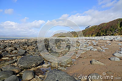 Rock boulders on Welsh beach Stock Photo