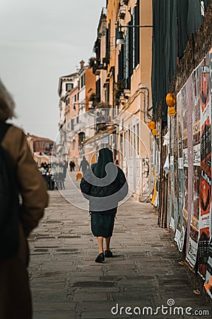 Nun walking on a street Editorial Stock Photo