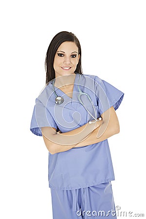 Brunette Caucasian woman doctor or nurse wearing blue scrubs Stock Photo