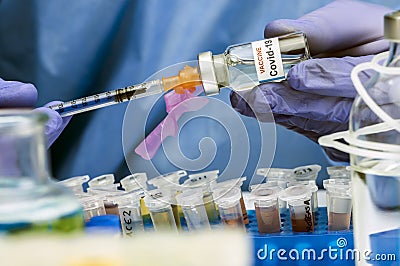 Nurse drawing with a syringe Coronavirus covid-19 experimental vaccine in a hospital Stock Photo