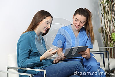 Nurse explaining medical procedure to a patient Stock Photo