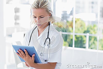 Nurse holding a digital tablet Stock Photo