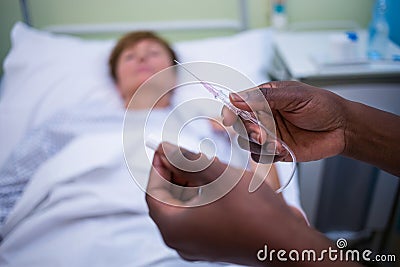 Nurse holding iv drip Stock Photo