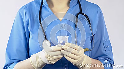Nurse holding pills dose for ill patient, pain killers, healthcare and medicine Stock Photo