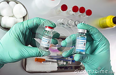 Nurse holds two covid-19 vaccines from different laboratorie Stock Photo
