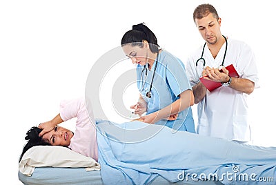 Nurse inject hurting patient woman Stock Photo