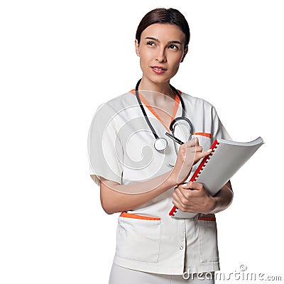 Nurse or medicine student writing in a file Stock Photo