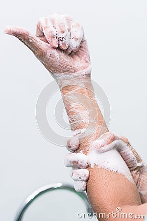 Nurse perform surgical hand washing, Preparation to the operating room. Closed-up of the hands. Stock Photo
