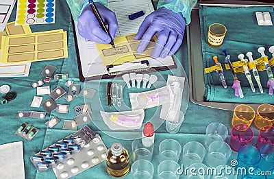 Nurse preparing hospital medication, placing dose medicine in glass monodose, conceptual image Stock Photo