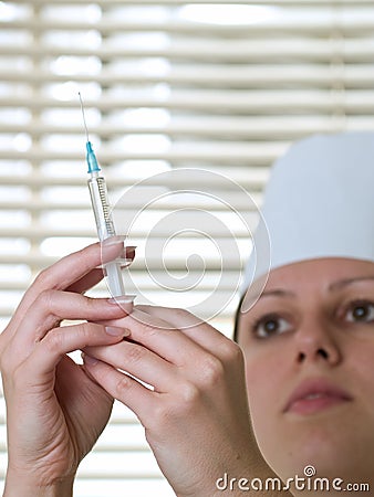 Nurse with squirt Stock Photo