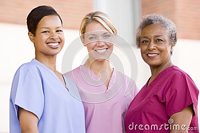 Nurses Standing Outside A Hospital Stock Photo