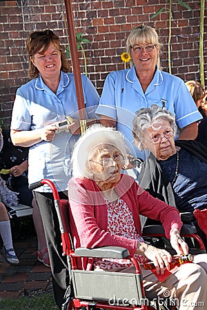 Nursing home residents and their carers Editorial Stock Photo
