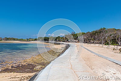 Nusa Dua beach during low tide, Bali island Stock Photo