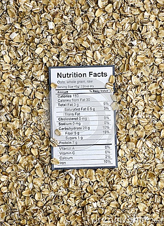 Nutrition facts of whole grain raw oats Stock Photo