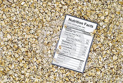 Nutrition facts of whole grain raw oats with oats background Stock Photo