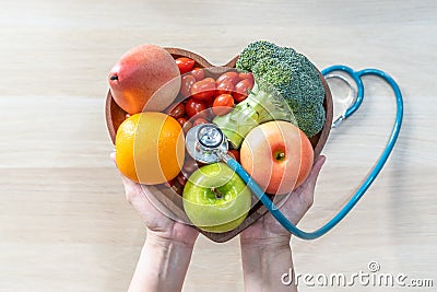 Nutritional food for heart health wellness by cholesterol diet and healthy nutrition eating with clean fruits and vegetables Stock Photo