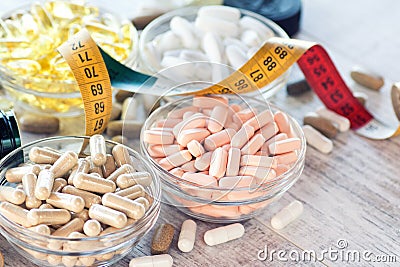 Nutritional supplements in capsules and tablets Stock Photo