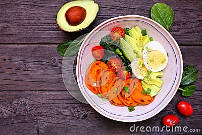 Nutritious breakfast bowl table scene on a dark wood background Stock Photo