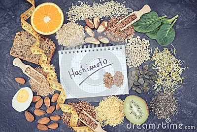 Nutritious ingredients, tape measure and inscription hashimoto. Healthy food containing vitamins. Problems with thyroid concept Stock Photo