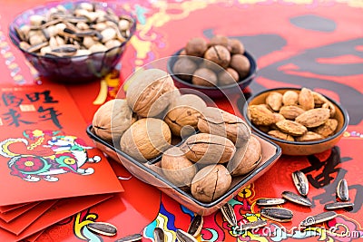 Nuts in the Background of Red Couplet in Spring Festival Stock Photo