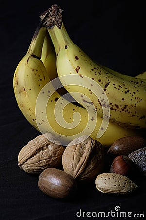 Nuts and bananas Stock Photo