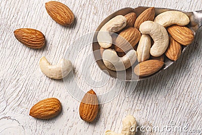 Nuts in silver spoon Stock Photo