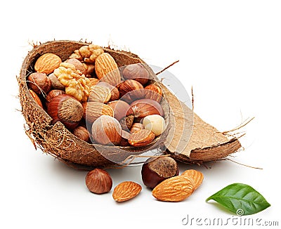 Nuts in cracked coconut Stock Photo