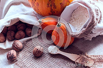Nuts, pumpkins and flour Stock Photo